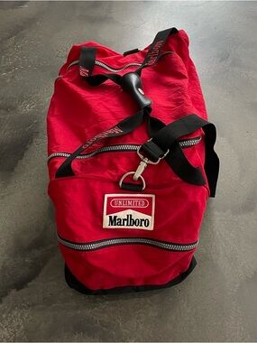 Marlboro Vintage Red Duffel Bag with Black Straps 21”x12x10” 
(Abr 026)
